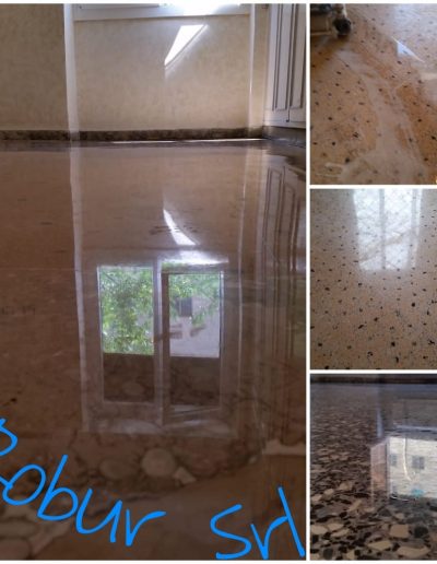 Pavimento in marmo lucidato professionalmente da Robur Service Srl, con effetto specchio e rifinitura impeccabile.
